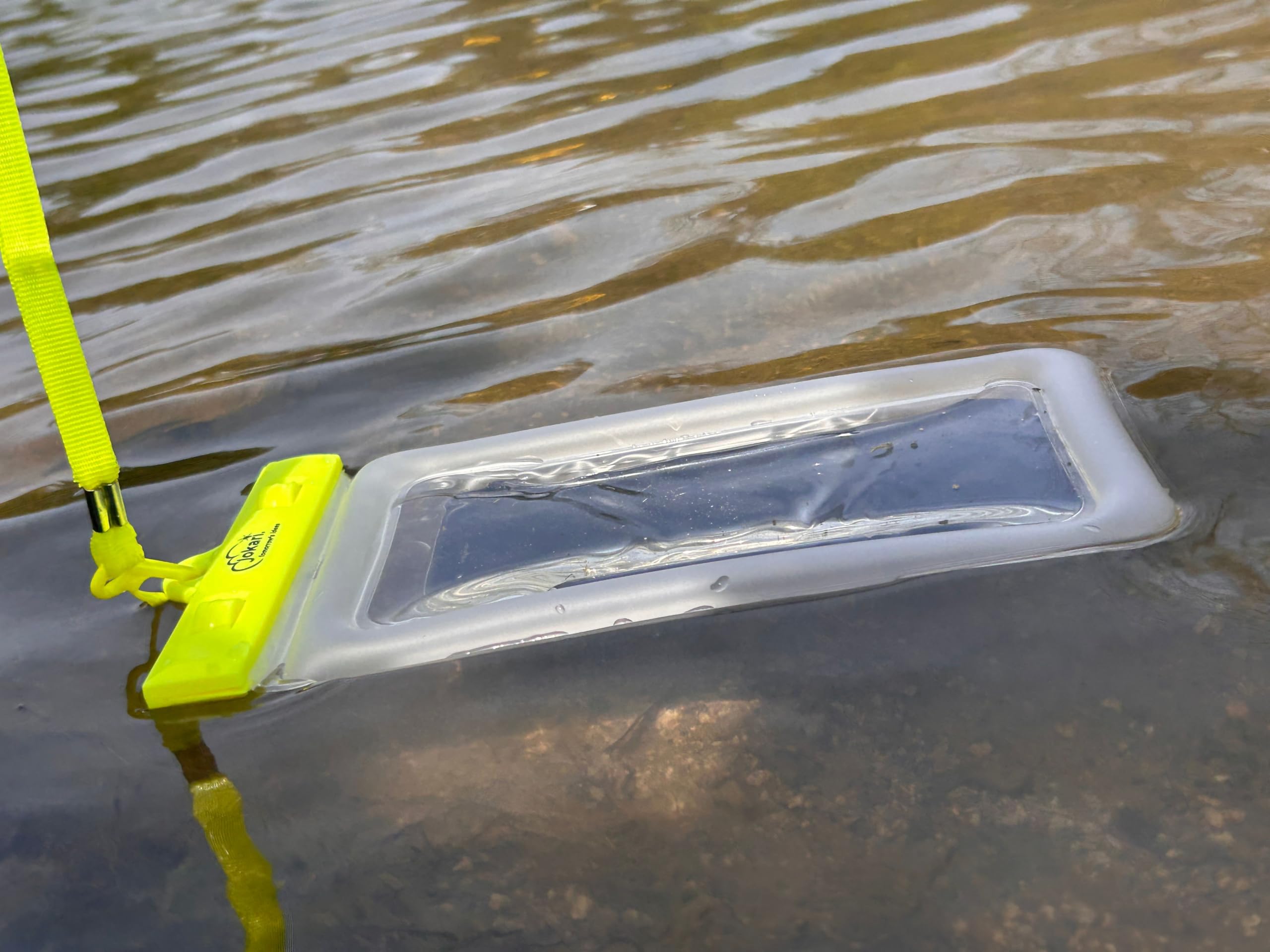 Jokari Waterproof Floating Phone Case with Neck Strap and Emergency Whistle. Use Touchscreen and Bluetooth in Pouch, Keep Your Phone Dry and Stay Safe on Boating Adventures (1) Clear - Image 3